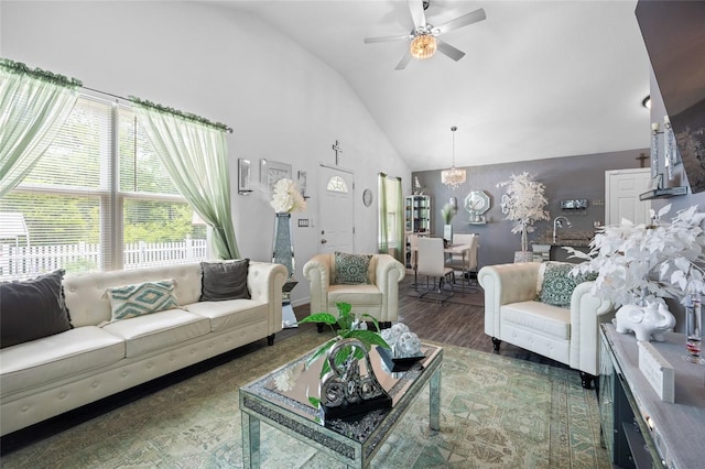 15324 SW 40th Place Rd, Ocala, FL 34481 - living area featuring a chandelier, a ceiling fan, wood finished floors, and high vaulted ceiling
