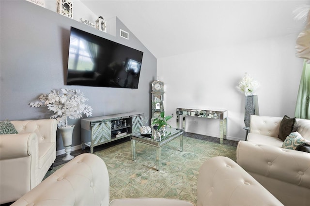 15324 SW 40th Place Rd, Ocala, FL 34481 - living room featuring vaulted ceiling, baseboards, and wood finished floors