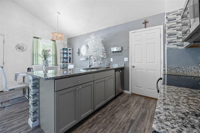 15324 SW 40th Place Rd, Ocala, FL 34481 - kitchen with gray cabinetry, stainless steel appliances, a peninsula, a sink, and dark wood finished floors