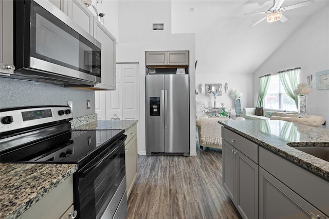 15324 SW 40th Place Rd, Ocala, FL 34481 - kitchen with appliances with stainless steel finishes, gray cabinets, high vaulted ceiling, ceiling fan, and dark wood-type flooring