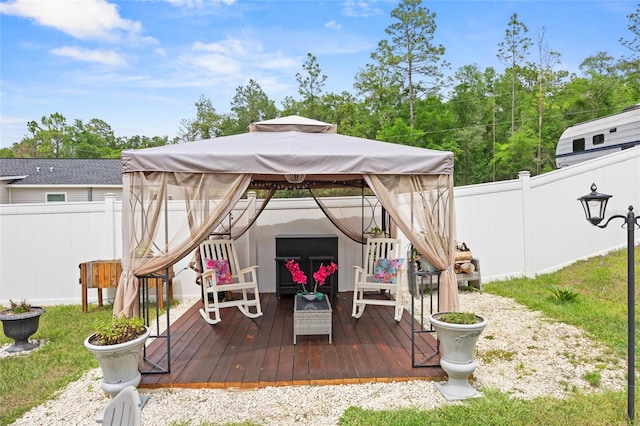 15324 SW 40th Place Rd, Ocala, FL 34481 - wooden deck featuring a gazebo and a fenced backyard