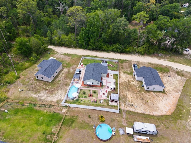 15324 SW 40th Place Rd, Ocala, FL 34481 - bird's eye view of a pool area and a forest