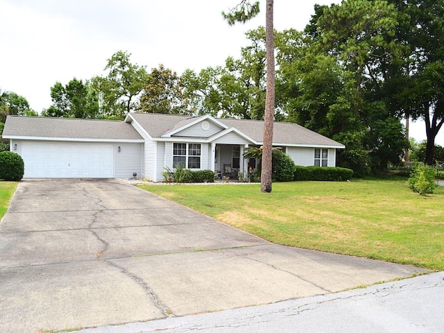 8321 SW 108th Place Rd, Ocala, FL 34481 - ranch-style home featuring a garage, a front yard, and concrete driveway