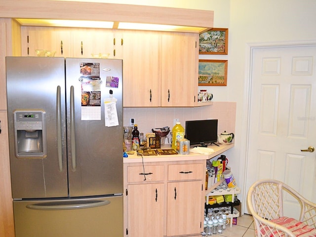 8321 SW 108th Place Rd, Ocala, FL 34481 - kitchen featuring stainless steel fridge, light countertops, decorative backsplash, light brown cabinets, and light tile patterned floors