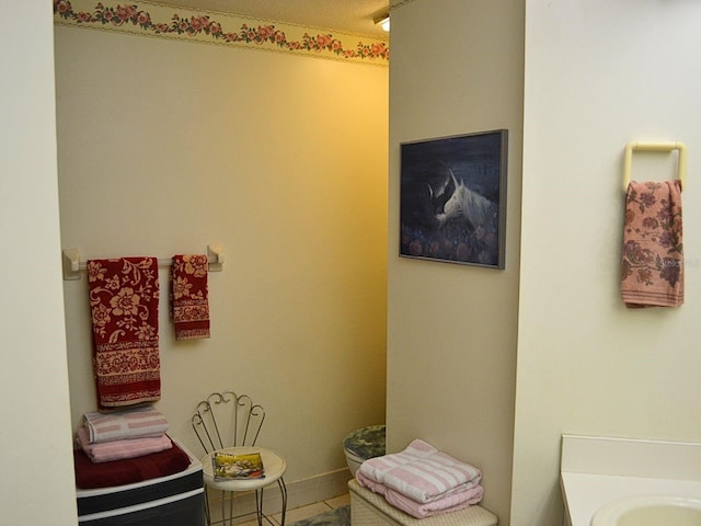 8321 SW 108th Place Rd, Ocala, FL 34481 - bathroom with tile patterned floors and vanity