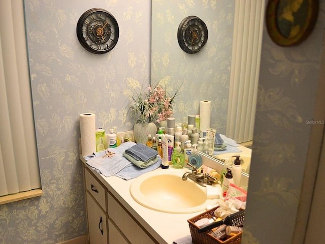 8321 SW 108th Place Rd, Ocala, FL 34481 - bathroom featuring vanity and wallpapered walls