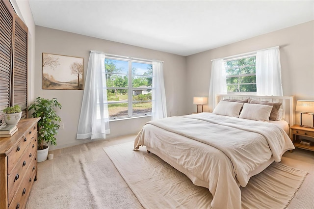 4467 SW Channel Heights Ct, Dunnellon, FL 34431 - bedroom featuring light colored carpet and baseboards