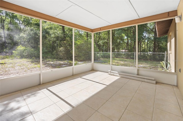 4467 SW Channel Heights Ct, Dunnellon, FL 34431 - unfurnished sunroom with view of scattered trees