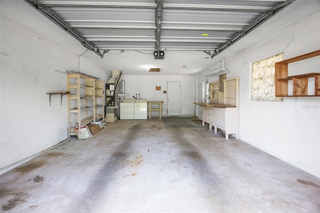 4467 SW Channel Heights Ct, Dunnellon, FL 34431 - garage with independent washer and dryer and a garage door opener