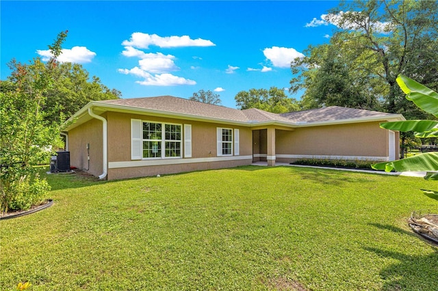 3445 SE 139th Ln, Summerfield, FL 34491 - ranch-style home featuring stucco siding, a front yard, and central AC unit