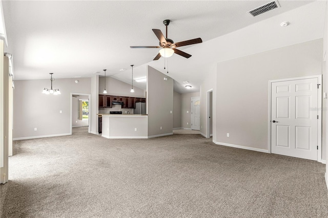 3445 SE 139th Ln, Summerfield, FL 34491 - unfurnished living room featuring a ceiling fan, light colored carpet, lofted ceiling, and baseboards