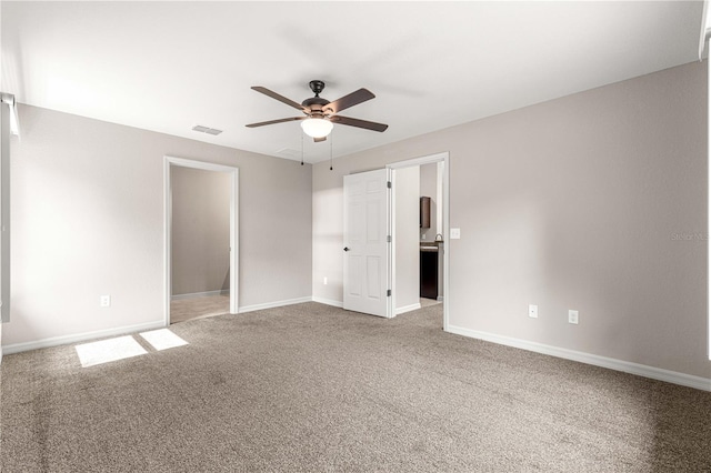 3445 SE 139th Ln, Summerfield, FL 34491 - unfurnished bedroom featuring carpet, baseboards, and ceiling fan