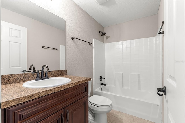 3445 SE 139th Ln, Summerfield, FL 34491 - full bath featuring vanity, toilet,  shower combination, a textured ceiling, and tile patterned flooring
