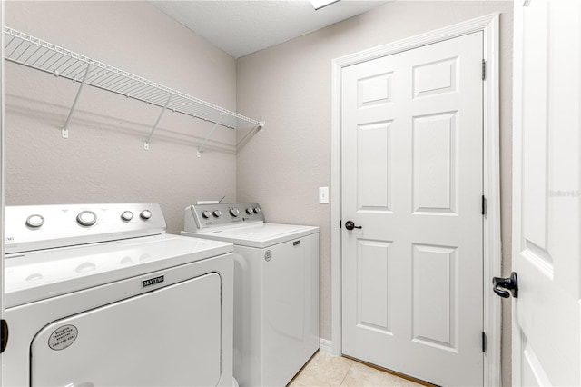 3445 SE 139th Ln, Summerfield, FL 34491 - washroom with independent washer and dryer and light tile patterned floors