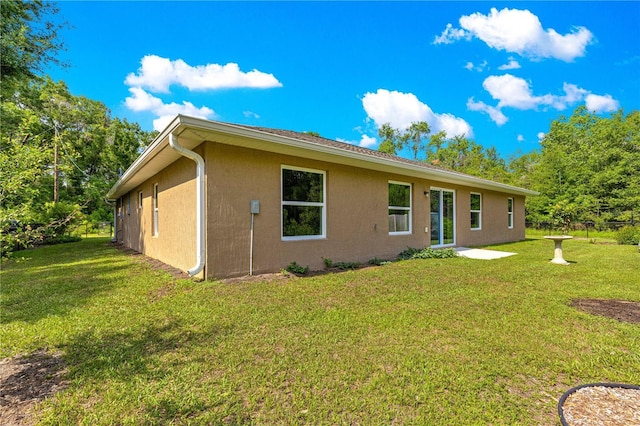 3445 SE 139th Ln, Summerfield, FL 34491 - view of front of home featuring stucco siding and a front yard