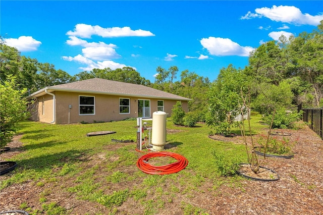 3445 SE 139th Ln, Summerfield, FL 34491 - back of property with stucco siding