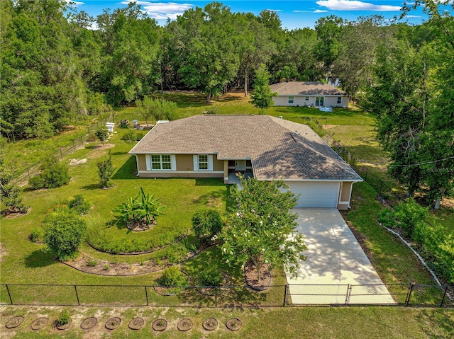3445 SE 139th Ln, Summerfield, FL 34491 - view of front of property featuring concrete driveway, stucco siding, and an attached garage
