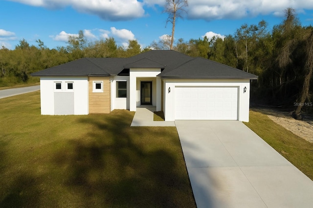 15215 SW 43rd Ct, Ocala, FL 34473 - view of front of house with a front lawn, a garage, driveway, and stucco siding