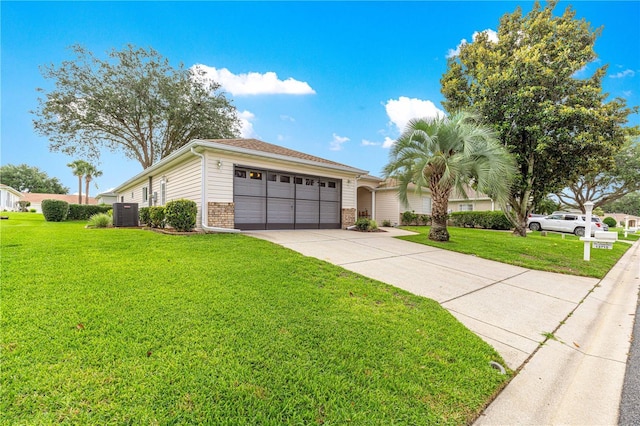 13715 SE 88th Ct, Summerfield, FL 34491 - ranch-style home featuring concrete driveway, a front lawn, central air condition unit, an attached garage, and brick siding