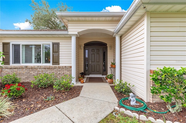 13715 SE 88th Ct, Summerfield, FL 34491 - view of exterior entry with brick siding