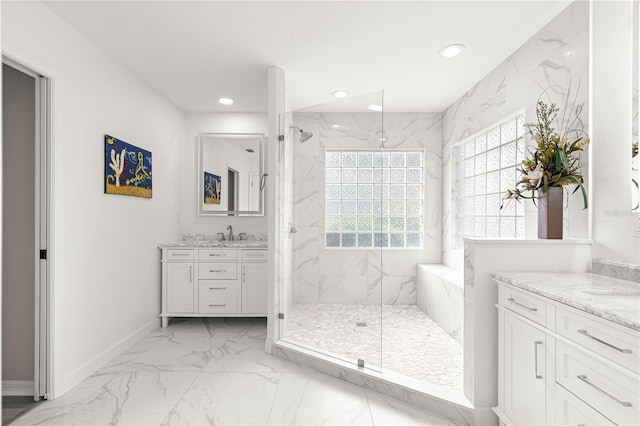 13715 SE 88th Ct, Summerfield, FL 34491 - bathroom featuring marble look tiles, a marble finish shower, recessed lighting, vanity, and baseboards