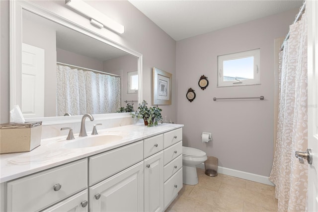 13715 SE 88th Ct, Summerfield, FL 34491 - bathroom featuring vanity, toilet, baseboards, and tile patterned flooring