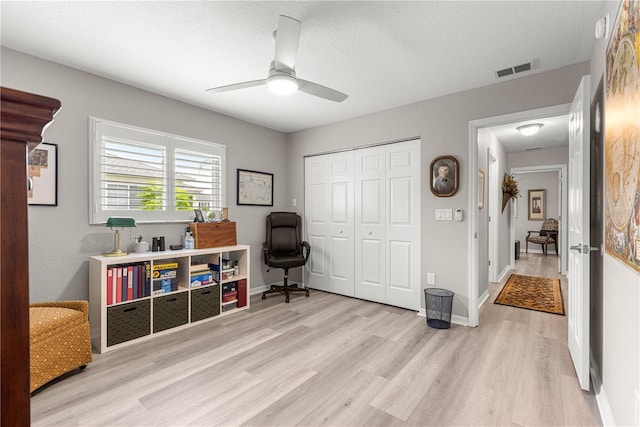 13715 SE 88th Ct, Summerfield, FL 34491 - office space featuring wood finished floors, ceiling fan, and baseboards