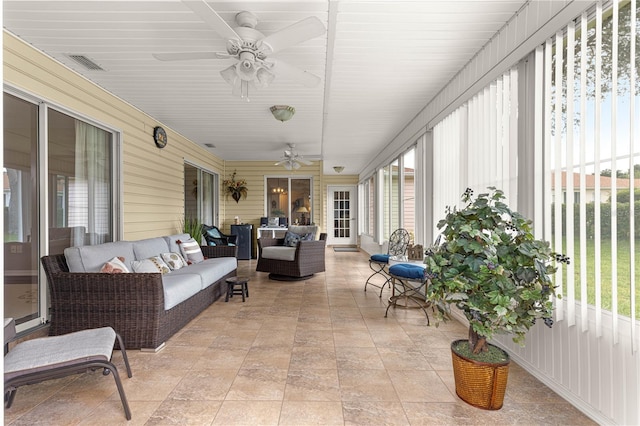 13715 SE 88th Ct, Summerfield, FL 34491 - sunroom featuring ceiling fan and an outdoor hangout area