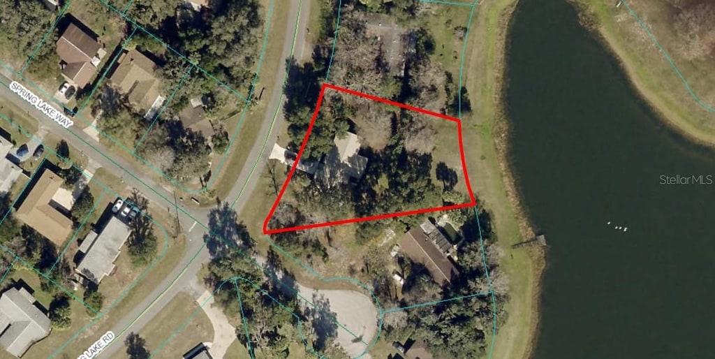 519 Spring Lake Rd, Ocala, FL 34472 - aerial map of property and surrounding area featuring property boundaries highlighted