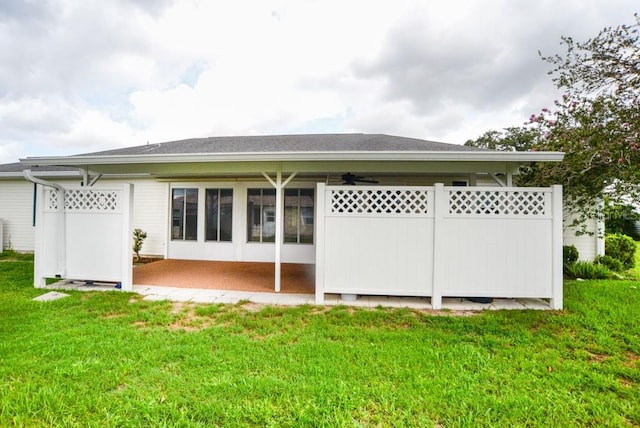 6190 SW 84th Pl, Ocala, FL 34476 - back of property with a patio area and a lawn
