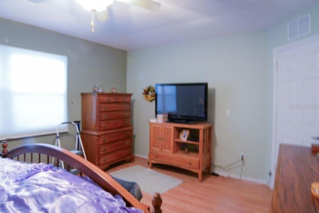 6190 SW 84th Pl, Ocala, FL 34476 - bedroom with light wood-type flooring and ceiling fan
