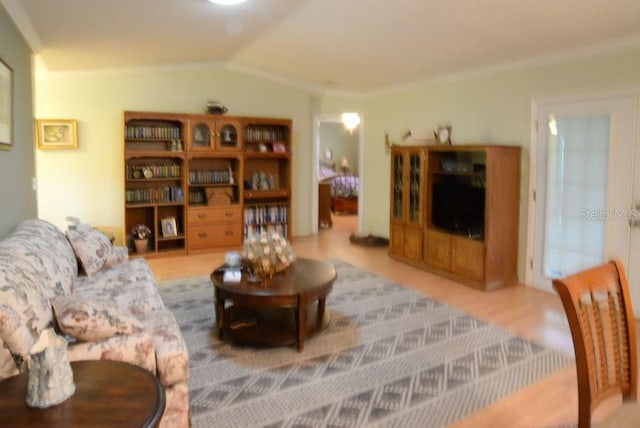 6190 SW 84th Pl, Ocala, FL 34476 - living area with wood finished floors, lofted ceiling, and crown molding