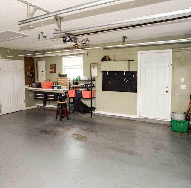 6190 SW 84th Pl, Ocala, FL 34476 - garage featuring a workshop area