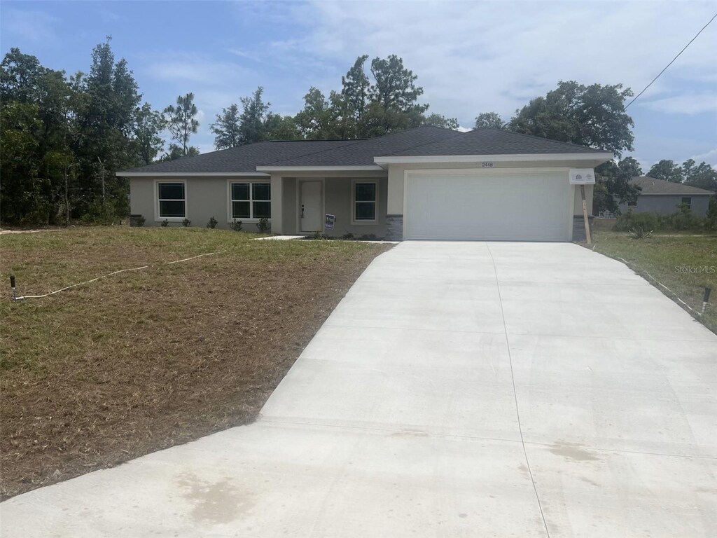2448 W Chamberlain St, Citrus Springs, FL 34434 - photo 1