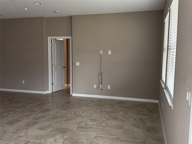 5255 NW 33rd Pl, Ocala, FL 34482 - unfurnished room with baseboards