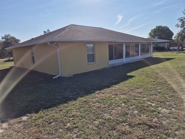360 Marion Oaks Golf Way, Ocala, FL 34473 - back of house featuring a sunroom, stucco siding, a yard, and a shingled roof