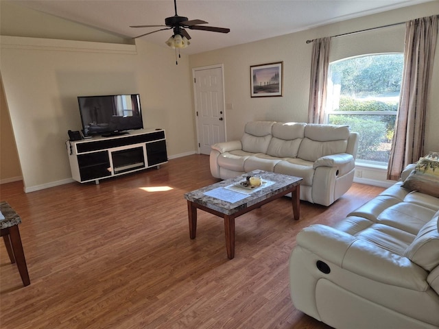 360 Marion Oaks Golf Way, Ocala, FL 34473 - living area with wood finished floors, a ceiling fan, vaulted ceiling, and baseboards