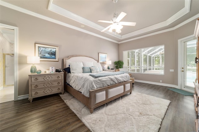7915 SE 12th Cir, Ocala, FL 34480 - bedroom with a tray ceiling, crown molding, access to outside, dark wood-style floors, and baseboards
