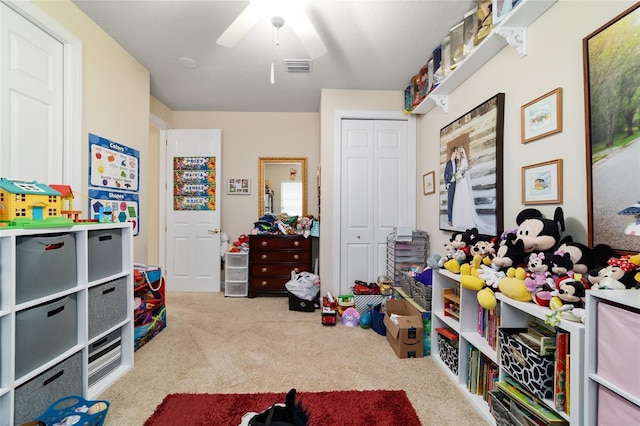 7915 SE 12th Cir, Ocala, FL 34480 - playroom featuring carpet floors and a ceiling fan