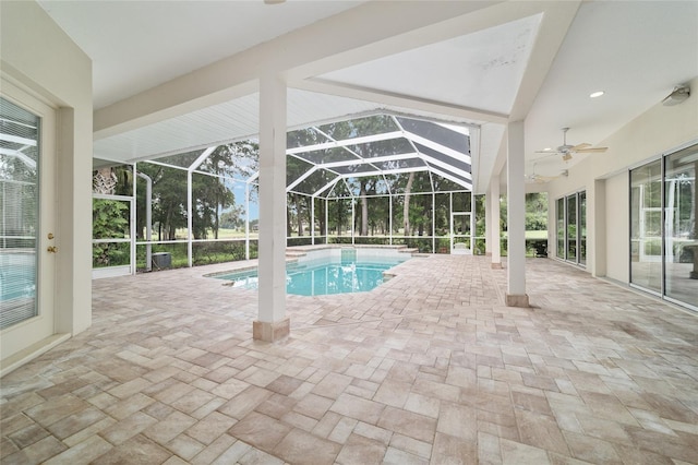 7915 SE 12th Cir, Ocala, FL 34480 - outdoor pool featuring a patio area, a lanai, and a ceiling fan