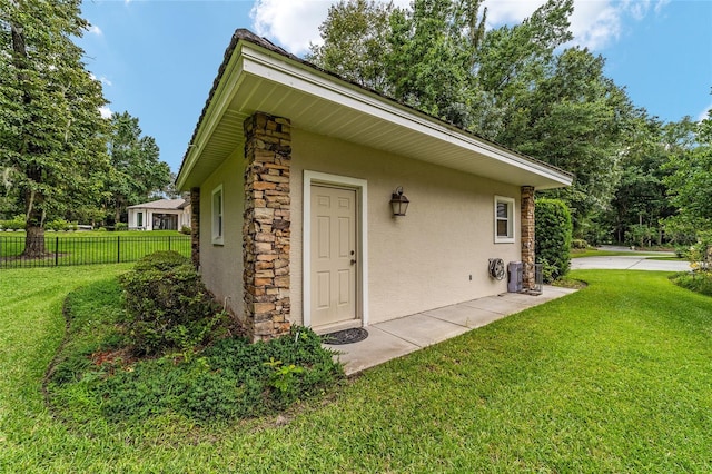 7915 SE 12th Cir, Ocala, FL 34480 - view of property exterior with stucco siding and stone siding