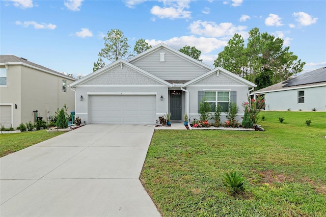 32 Hickory Course Loop, Ocala, FL 34472 - view of front facade featuring a garage, a front yard, concrete driveway, and stucco siding