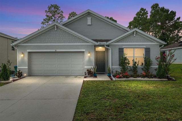 32 Hickory Course Loop, Ocala, FL 34472 - view of front of home featuring an attached garage, driveway, a front lawn, and stucco siding