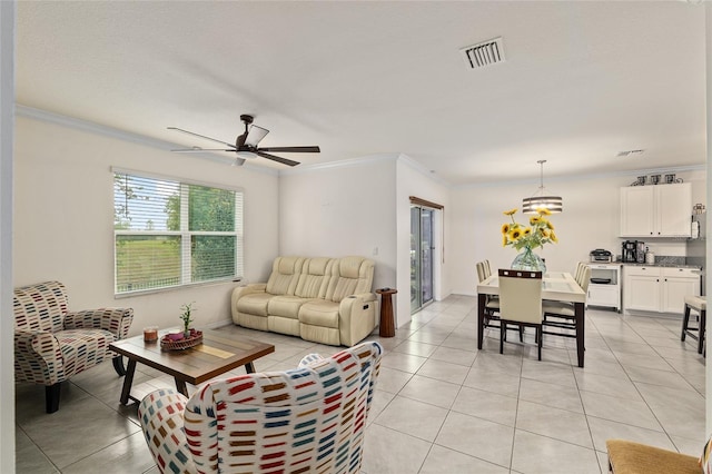 32 Hickory Course Loop, Ocala, FL 34472 - living area with ornamental molding, light tile patterned flooring, ceiling fan, and a chandelier