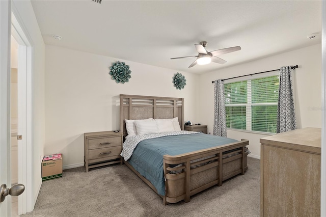 32 Hickory Course Loop, Ocala, FL 34472 - bedroom featuring light carpet, baseboards, and a ceiling fan