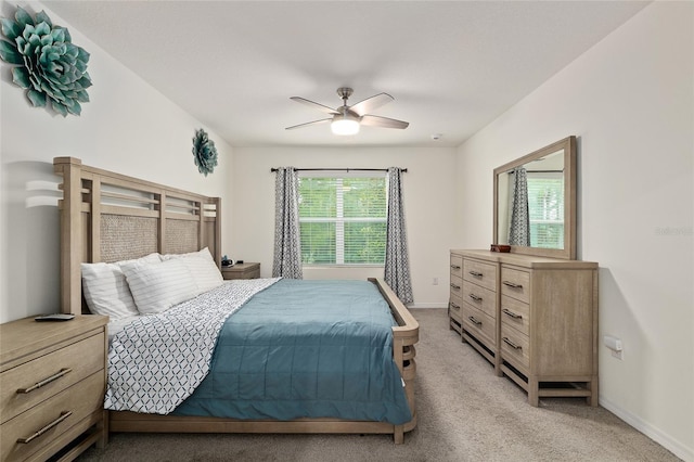 32 Hickory Course Loop, Ocala, FL 34472 - bedroom featuring light carpet, baseboards, and ceiling fan