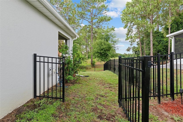 32 Hickory Course Loop, Ocala, FL 34472 - view of yard featuring a gate