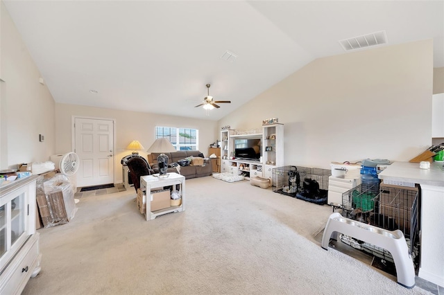 3418 SW 155th Pl, Ocala, FL 34473 - living area with vaulted ceiling, ceiling fan, and light carpet