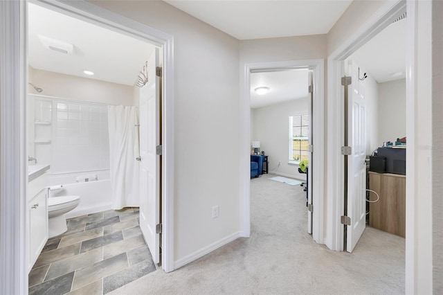 3418 SW 155th Pl, Ocala, FL 34473 - corridor featuring carpet and baseboards