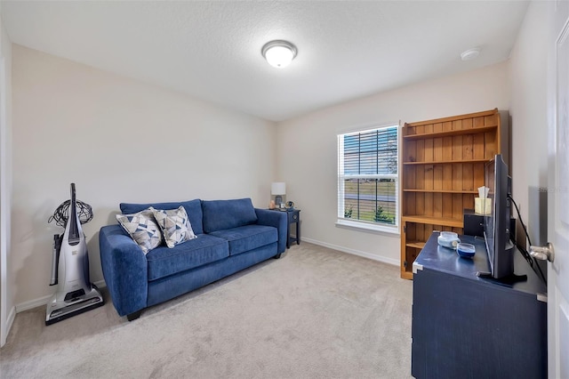 3418 SW 155th Pl, Ocala, FL 34473 - living room featuring light colored carpet and baseboards